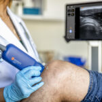 Musculoskeletal MSK Ultrasound doctor scanning Knee
