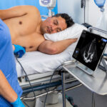Physician scanning with Kosmos by EchoNous