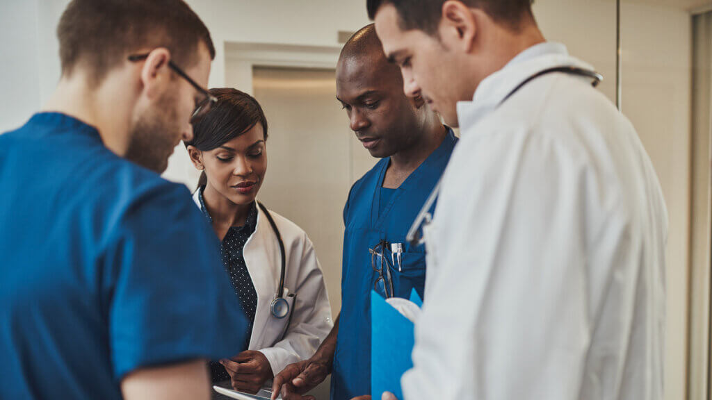 group of doctors reaching pocus consensus